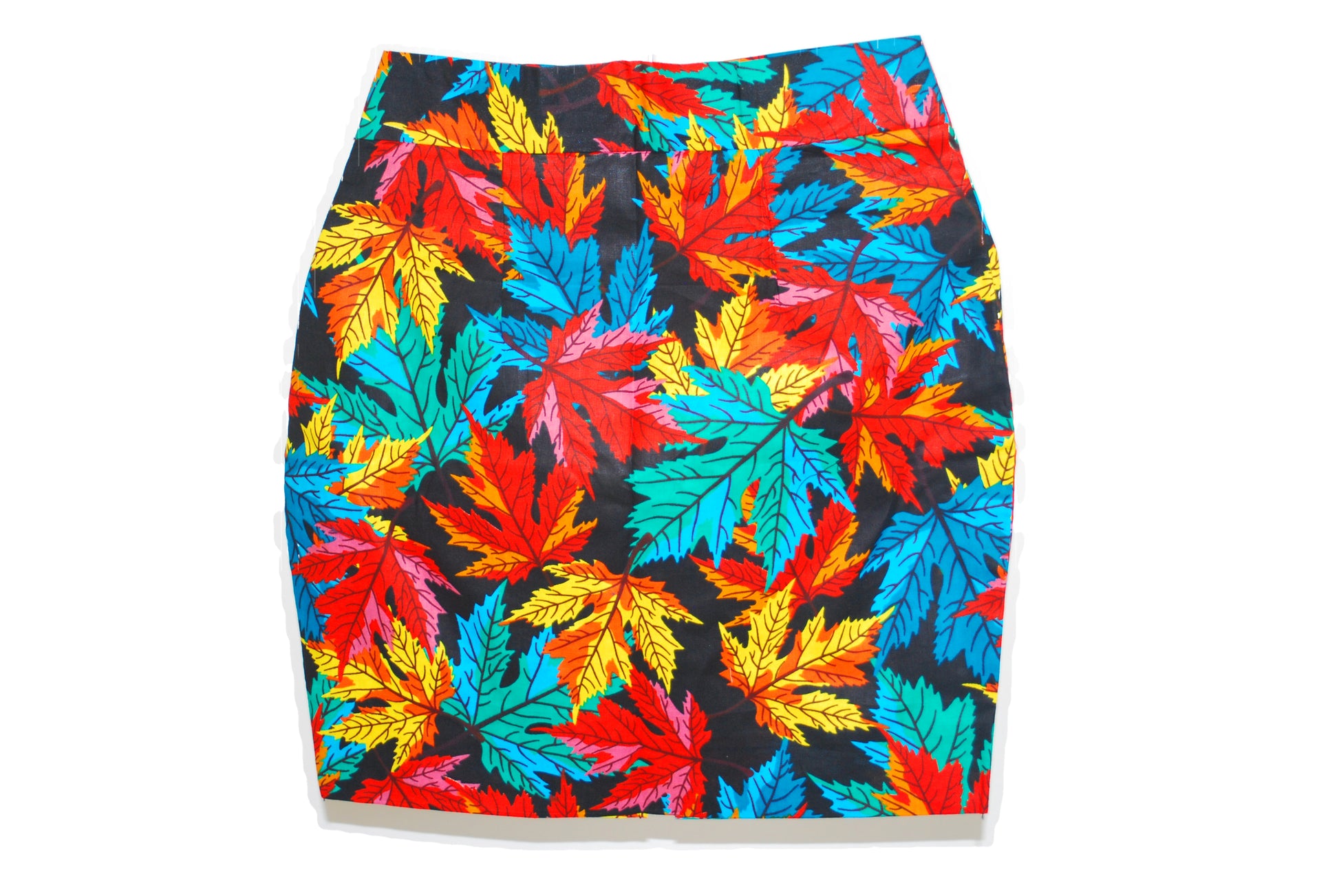 Colorful leaf patterned skirt on a white background